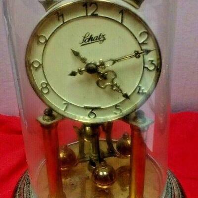 https://www.ebay.com/itm/124377651439	LX3030 10 INCH HIGH USED VINTAGE LCHATZ WIND UP BRASS CLOCK WITH GLASS DOME 		 OBO 	 $22.99 
