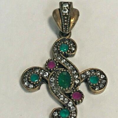 https://www.ebay.com/itm/124401676456	WL184 STERLING SILVER PENDANT WITH PINK, GREEN AND CLEAR GEMS 		 Buy-it-Now 	 $20.00 
