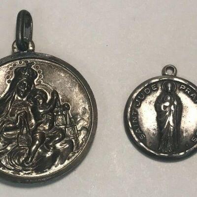https://www.ebay.com/itm/114477673370	WL198 LOT OF 2 RELIGIOUS PENDANTS STAMPED 800 AND STERLING 		 Buy-it-Now 	 $20.00 
