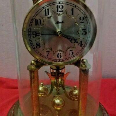 https://www.ebay.com/itm/124377648258	LX3031 10 INCH HIGH USED VINTAGE HERMLE WIND UP BRASS CLOCK WITH GLASS DOME 		 OBO 	 $22.99 

