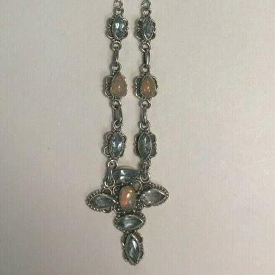 https://www.ebay.com/itm/124401623714	WL192 STERLING SILVER NECKLACE WITH OPALS AND LIGHT BLUE GEMS		 Buy-it-Now 	 $25.00 
