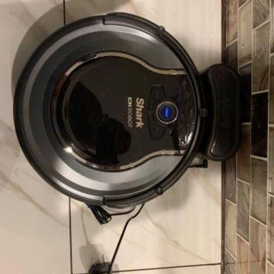 2074	

Shark Ion Robot Vacuum
Includes Vacuum And Charger Dock Model No: RV750