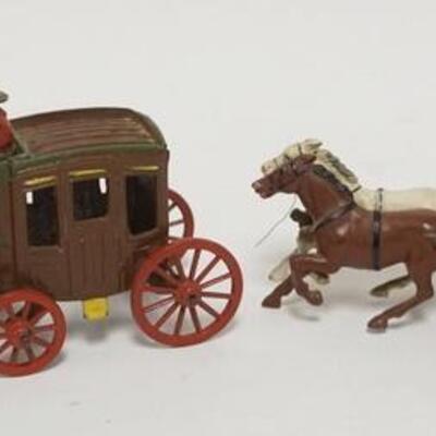 1021	TWO CAST IRON STAGE COACH TOYS W/ DRIVERS & SHOT GUN RIDERS. 6 3/4 IN L 	50	100	20	PLEASE PAY ATTENTION FOR DAILY ADDITIONS TO THIS...