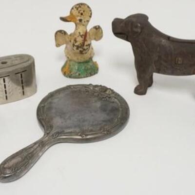 1035	LOT OF METAL ITEMS W/ DOG NUT CRACKER & DUCKLING STILL BANK LOT ALSO INCLUDES A TRIVIT W/ GOOD LUCK SYMBOL, BOONTON NATIONAL BANK...
