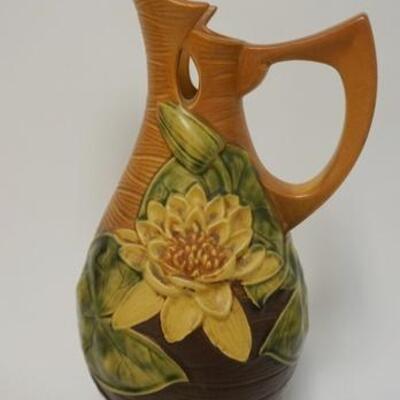 1003	ROSEVILLE BROWN WATER LILY EWER, 15 1/2 IN HIGH	100	200	25	PLEASE PAY ATTENTION FOR DAILY ADDITIONS TO THIS SALE. PARTIAL UPLOADS...