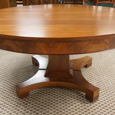 1048	60 IN ROUND CHERRY PEDESTAL TABLE. HAS SIX 11 1/8 IN LEAVES TWO ARE FINISHED FOUR ARE PAINTED, ONE OF THE PAINTED LEAVES IS SPLIT...