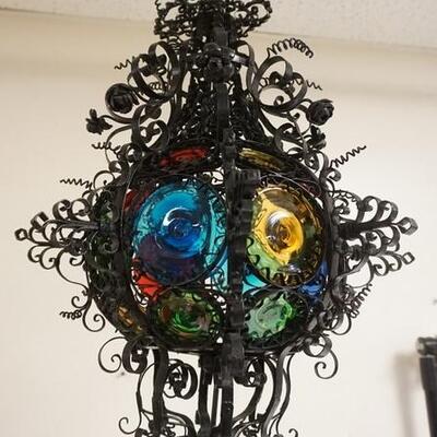 1078	WROUGHT IRON HANGING LIGHT FIXTURE FOR CANDLE W/MULTI COLORED GLASS BULLS EYES, APPROXIMATELY 22 IN TALL	100	200	50	PLEASE PAY...