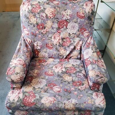 1960's club chair.  The floral fabric is a slipcover.  Underneath is orange heavy tweed upholstery. $50 or best offer.