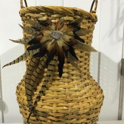 Large basket with feathers