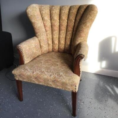 Scalloped wing back chair
