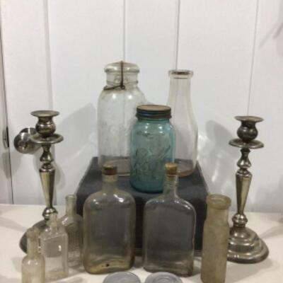 Vintage bottles and candle sticks