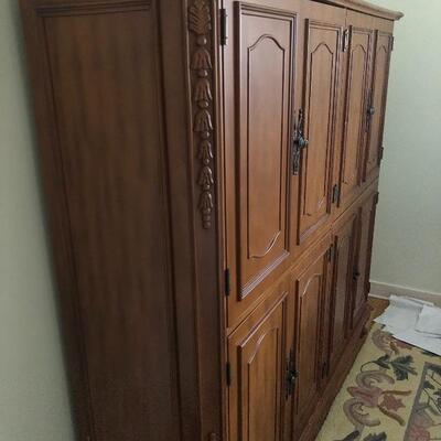Set of two narrow and in good shape storage  armoires.