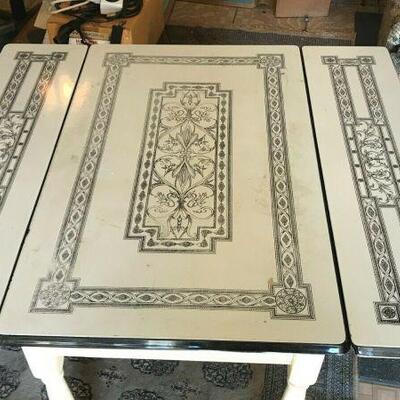https://www.ebay.com/itm/114561556205	FL0002 ANTIQUE ENAMEL BREAKFAST TABLE WITH LEAVES Pickup Only		 Buy-it-Now 	 $250.00 
