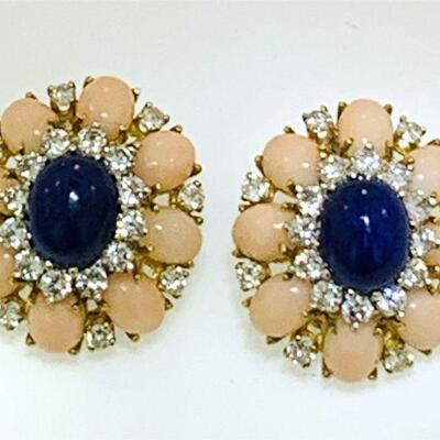 Gorgeous pair of 18kt gold lapis, coral & diamond earrings. Each earring features one (1), prong set, oval cabochon lapis set in the...