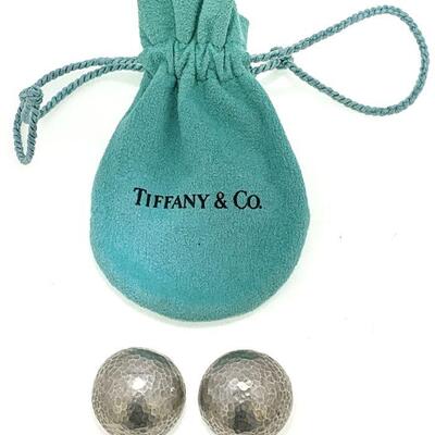 Pair of Tiffany & Co. Paloma Picasso sterling silver domed hammer earrings in bag. The earrings each measure approx. 1.75