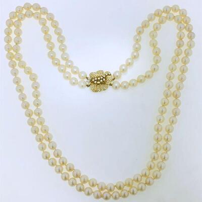 One double strand cultured pearl necklace with one 27.00