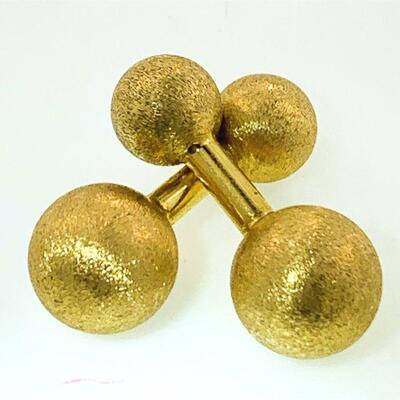 Pair of 14kt gold ball design cuff links. Each cuff link has one larger ball measuring 12.35mm, one smaller at 9.50mm, have a satin...
