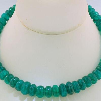 This piece is absolutely stunning! The unique emerald graduating round oval cabochon bead necklace features a total of fifty five (55),...