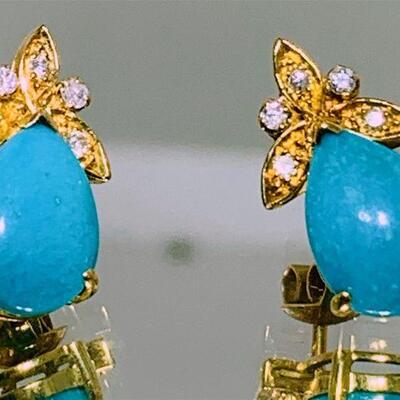 One pair of 18kt gold turquoise & diamond drop style earrings. Each earring features one (1), prong set, pear shaped cabochon turquoise...
