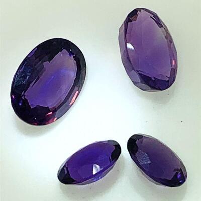 Group of five (5) oval faceted amethyst. The amethyst are as follows: 1@ 18.15 x 13.30 x 9.00mm, 1! 9.30 x 14.45 x 9.25mm, 2@ 14.05 x...