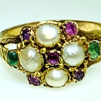 15kt gold pearl, ruby & emerald ring (size 5). The ring features four (4), bezel set, seed pearls set with five (5), prong set, square...