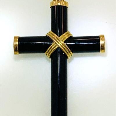 One Kaiyin onyx & 14kt gold cross. The cross measures approx. 2.75 x 1.67