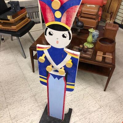 Vintage nutcraker coat rack with measuring device