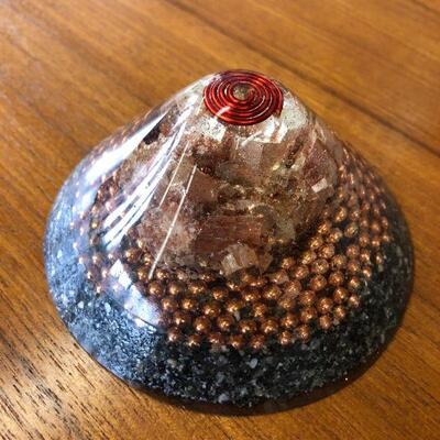 Vintage acrylic paperweight with copper embedments