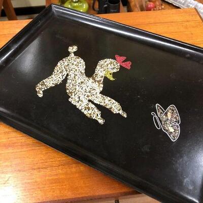 Couroc poodle and butterfly