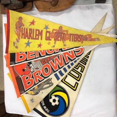 Vintage sports pennants, NY Cosmos and Harlem Globetrotters