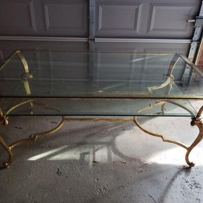 Glass Accent Table https://ctbids.com/#!/description/share/675682 This brass framed accent table is 24