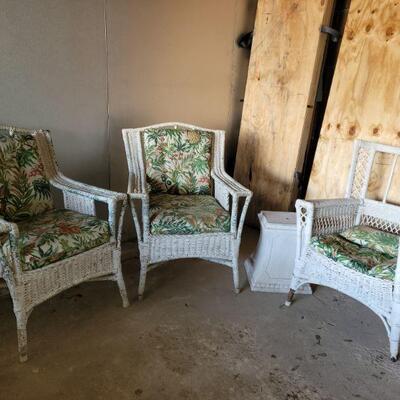 Wicker Chairs w/ Plant Stand https://ctbids.com/#!/description/share/675679 Three solid weathered wicker chairs. One chair is missing the...