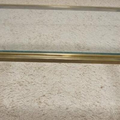 1125	BRASS COFFEE TABLE WITH INSET GLASS TOP, 30 IN DEEP X 55 IN WIDE X 16 3/4 IN HIGH	100	200	50	PLEASE PAY ATTENTION FOR DAILY...