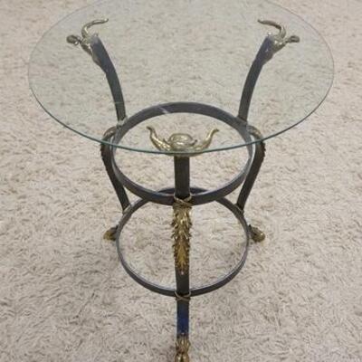 1114	ROUND GLASS TOP TABLE ON METAL BASE W/BRASS RAM HEAD MOUNTS & HOOF FEET	75	150	25	PLEASE PAY ATTENTION FOR DAILY ADDITIONS TO THIS...