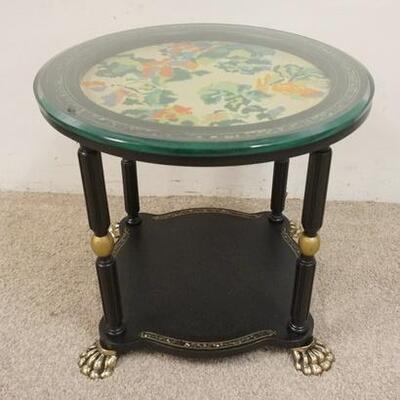 1034	BLACK ROUND STAND W/MOTHER OF PEARL INLAY BORDERS & INSET UPHOLSTERED FLORAL DESIGN GLASS TOP & BRASS PAW FEET, 20 IN ROUND, 18 1/4...