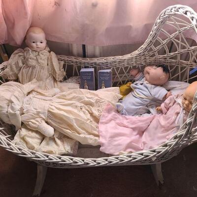 Wicker Bassinet And Dolls
https://ctbids.com/#!/description/share/679246 Five baby dolls one porcelain headed, two plastic, a cloth doll...