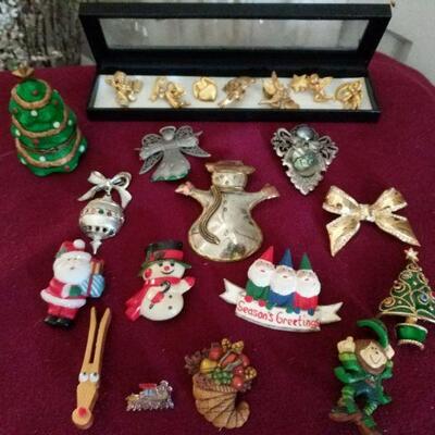 Holiday Brooches
https://ctbids.com/#!/description/share/679326 On the Angel of the Day broaches, unfortunately Tuesday's head is...