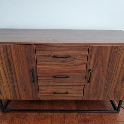 https://ctbids.com/#!/description/share/685482 Wood veneer console with metal frame base. 2 cabinets and 3 drawers. 47x16x30