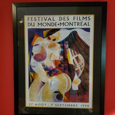https://ctbids.com/#!/description/share/687666 Framed print of Festival Des Films Du Monde Montreal September 1998 by Almada Ramos matted...