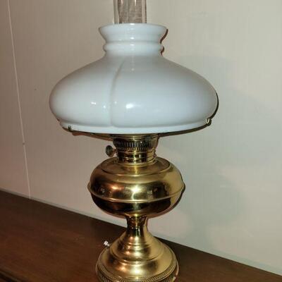 https://ctbids.com/#!/description/share/682544 Brass and milk glass hurricane lamp. This lamp is in great condition with a shining brass...