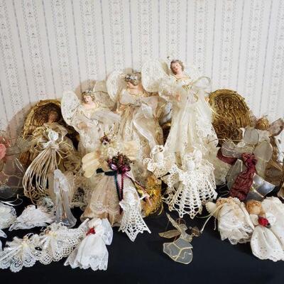 https://ctbids.com/#!/description/share/682563 Beautiful collection of angels in gold and white. Includes 3 angels on stands 15