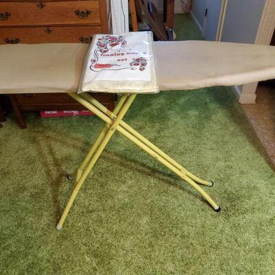 https://ctbids.com/#!/description/share/682572 Vintage ironing board with a Teflon cover all in one coated set included. 