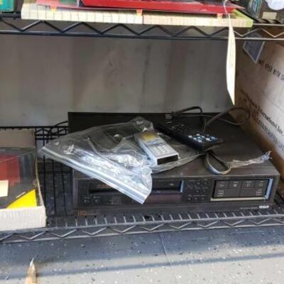 #5146 â€¢ RCA VCR Player, Hanging File Folders, And Aero Air Mattress