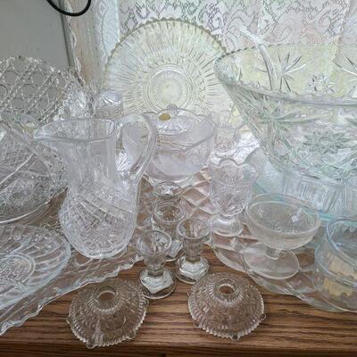 Mix of glass and crystal pieces. Two pieces the ones with swans still have the sticker that say they are 24 percent lead crystal made in...