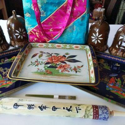 Nice collection to add to your Asian decor. Trays are made of metal and lanterns are ceramic. Includes chopsticks, a parasol and silk...
