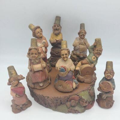 These small gnomes all depict a part of sewing. Each has a thimble on top of their heads. Tallest measures 2