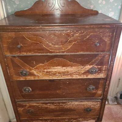 Dresser has four drawers for storage. Contents not included.
Measures 32