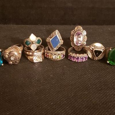 Collection of vintage rings in sterling silver settings. All are marked 925 or Sterling. Other maker marks are present on some. Heart...