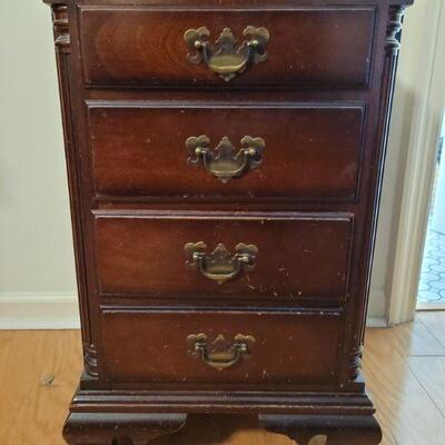https://ctbids.com/#!/description/share/687820 Four drawer Kling genuine mahogany side table. Measures 28
