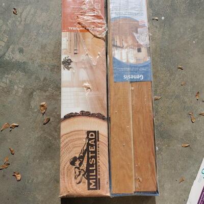 https://ctbids.com/#!/description/share/687751 2 new boxes of laminate wood flooring. Each box has 20 square feet of material. Both...